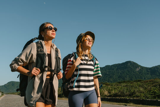 Focused hikers under a clear sky