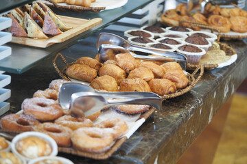 Delicious selection of baked goods in a cozy bakery display