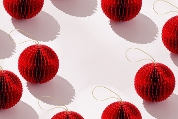 Minimal frame of red paper Christmas ornaments shaped round balls on light white, stylish holiday...