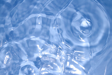 Calm Water Surface with Gentle Ripples and Light Reflections