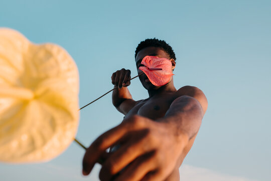 Black Man With Colorful Flowers Vibrant Portrait