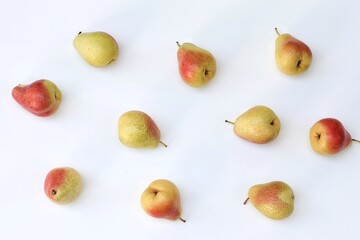 Pears on a white background, fruit pattern, top view, on the table