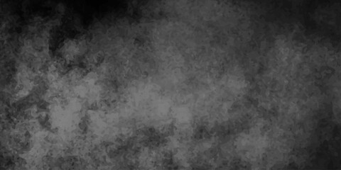 Dark and textured, this vintage grunge wall features a pattern of black, gray, and dirty white for a rough, aged background