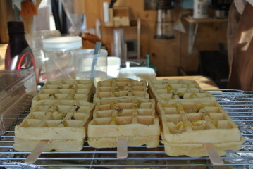 Baking waffles at a market shop