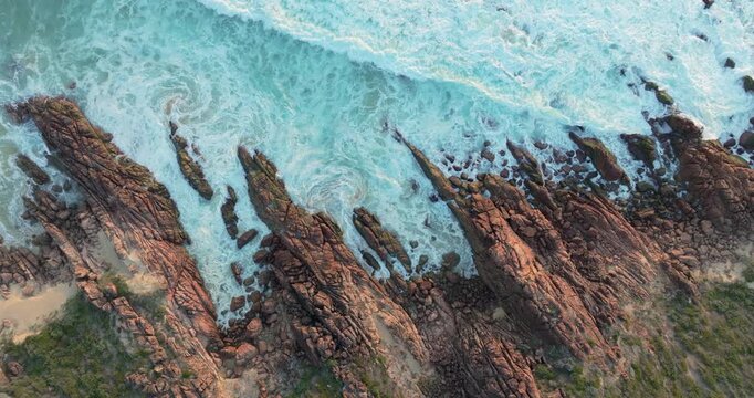 4k Aerial views of rugged rocky coastline in South West Australia at sunset