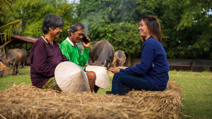 Friends share stories and laughter while enjoying each other's company in a rural setting during a sunny afternoon
