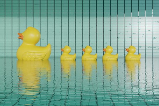 Rubber Duck Family Floating in Water with Abstract Tiled Background