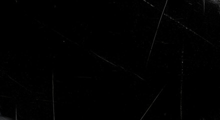 Scratched black surface texture, abstract dark background with light traces