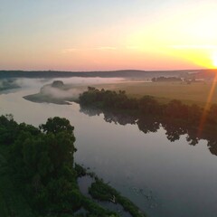 Serene river sunrise landscape