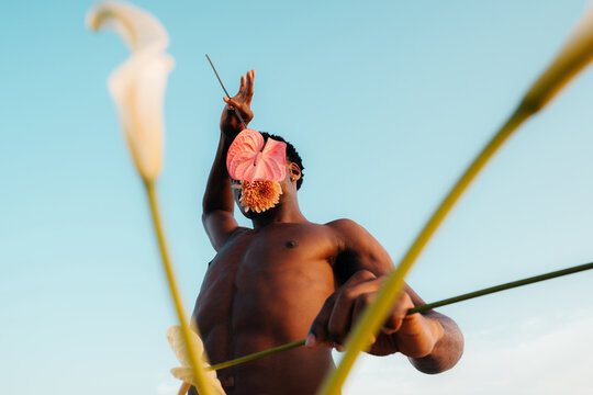 Black Man With Colorful Flowers Vibrant Portrait
