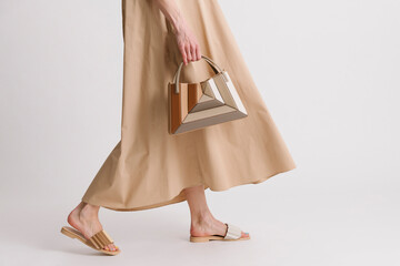 Fashionable Minimalist Style Featuring Beige Dress and Unique Ge