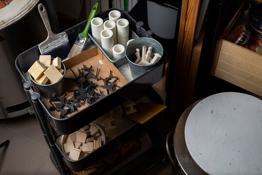 Top view of diy tools, materials, blanks and stencils in an workshop