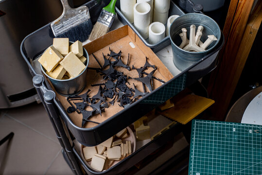 Top view of diy tools, materials, blanks and stencils in an workshop