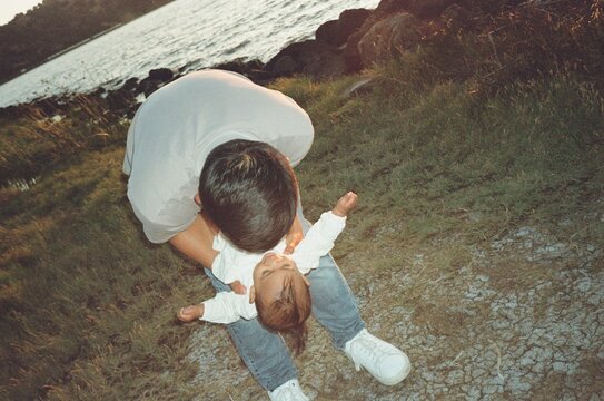 playful dad baby