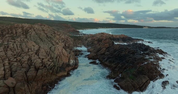 4k Aerial views of rugged rocky coastline in South West Australia at sunset