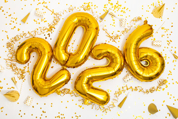 Celebration With Golden Balloons and Confetti for New Year 2026