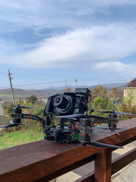 Professional cinema drone on wooden rail