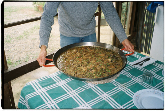 paella on the porch table, 35mm