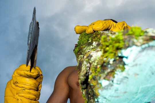 Shirtless Man with Axe and Mossy Log Rural Activity