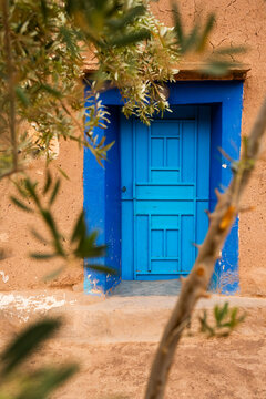 Colorful door on an adobe house