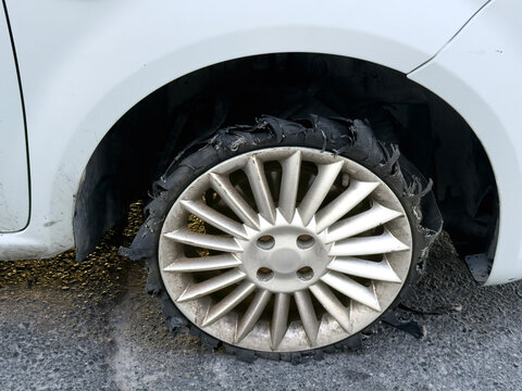 torn, shredded car tire