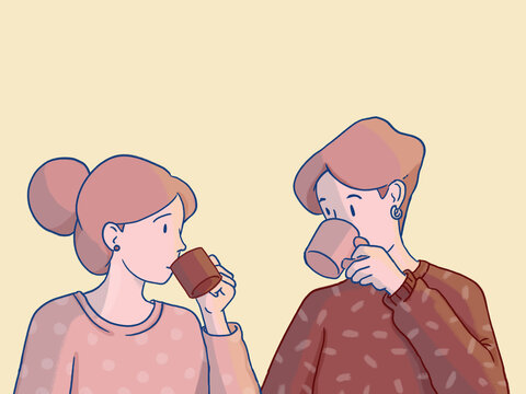 Young couple enjoying morning coffee together in quiet moment