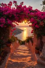 Romantic stone pathway leading to the sea at sunset, framed by vibrant bougainvillea flowers arch with golden sunlight creating a magical scenic Mediterranean atmosphere