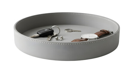 Elegant grey leather catchall tray holding keys, watch, and cufflinks, organizing personal essentials with modern style and sophistication.