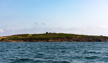 View of the coast of an island from the sea