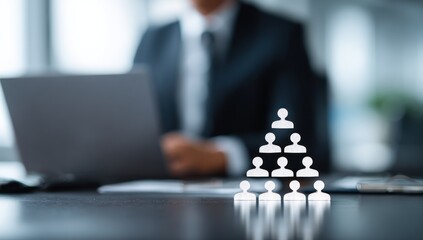 Business hierarchy illustrated on a desk