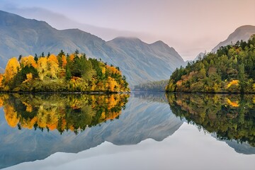 Fototapeta premium Symmetrical Mountain Landscape Reflection in Calm Lake Water