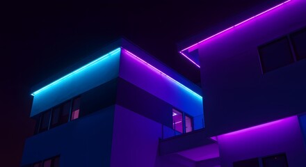 Modern building exterior at night illuminated with vibrant neon lights in shades of blue and purple.