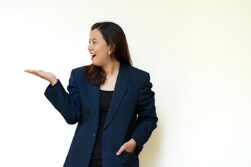 Confident businesswoman crossing arms and smiling on white background
