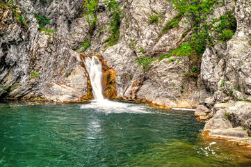Beautiful landscape with waterfall in the mountain