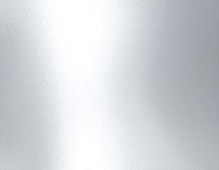 A sleek, modern white refrigerator stands prominently in a bright kitchen, its smooth surface free of any frost, showcasing its pristine condition.