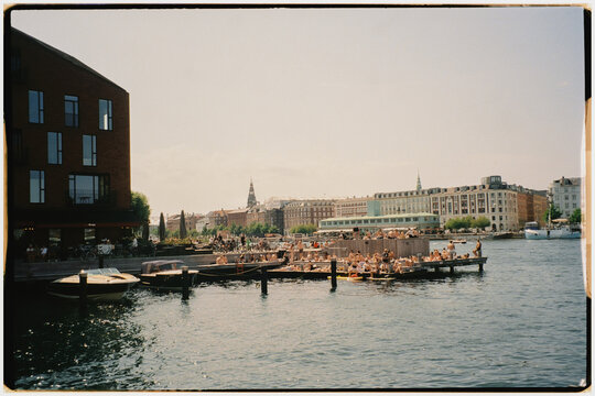 Film shot of a city harbor crowded with tourists in Copenhagen