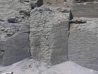 Massive hexagonal basalt columns rock face texture