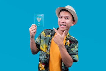 Bandung, Indonesia - 8 August 2025: Smiling Tourist Man Pointing an Indonesian Passport