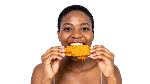 Enjoying crispy fried chicken home kitchen food photography bright lighting close-up culinary delight