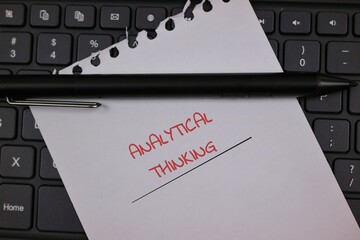Analytical Thinking Concept With Note, Pen and Keyboard on Desktop