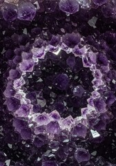 Close-up of a natural amethyst crystal geode, with deep purple formations creating a central opening.