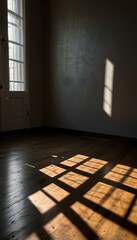 Sunlight streaming through window casting long soft shadows on polished wooden floor in modern minimalist living space