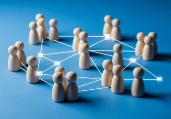 Interconnected wooden peg dolls forming a complex network structure on a blue background. This abstract image symbolizes social connection, business collaboration, and digital communication systems.