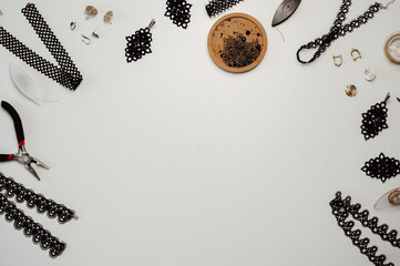 Copy space banner with tatting instruments and ready jewelry pieces. Frivolite, handmade jewelry...