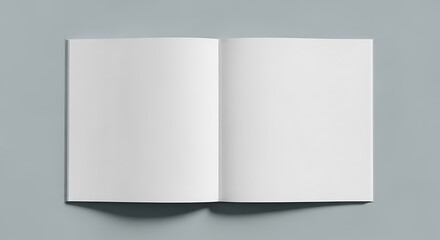 Open blank book with white pages on a gray background