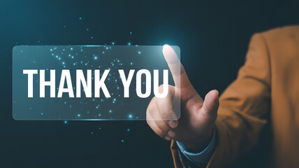 Professional businessman expresses gratitude by touching a digital "Thank You" screen