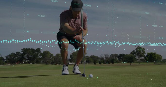 Golfer stepping onto green, squatting behind ball and aligning putter for practice stroke in golf