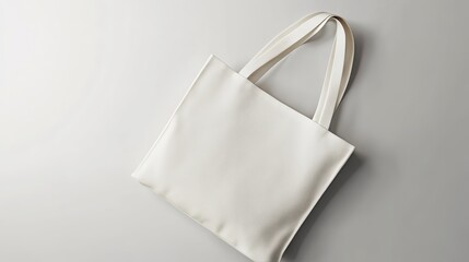 Canvas tote bag mockup lying flat with customizable print space for creative designs