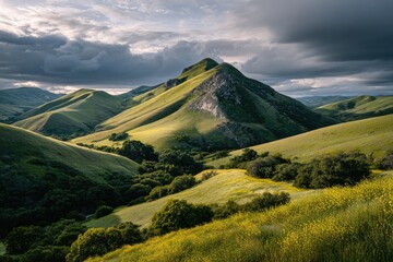 Fototapeta premium Mountain valley, dramatic light, rolling hills
