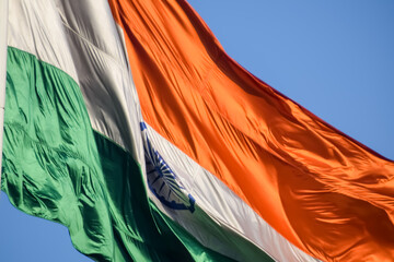 India flag flying high at Connaught Place with pride with plain white background, India flag...
